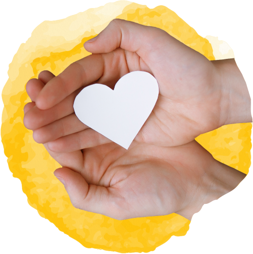 cupped open hands holding a cut-out heart shape